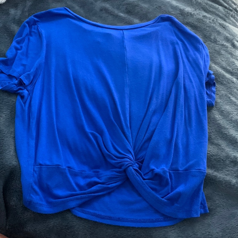 Navy blue with permanent knot at the bottom in the middle
